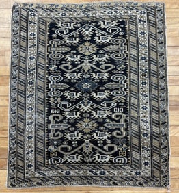 ANTIQUE CAUCASIAN ORIENTAL SCATTER RUG.
