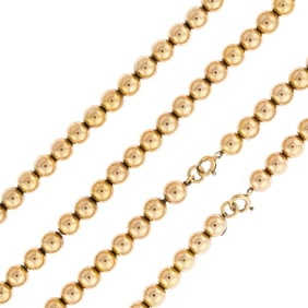 TWO VINTAGE 14K GOLD BEADED NECKLACE.