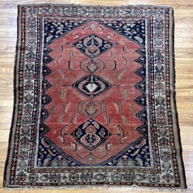 ANTIQUE ORIENTAL AREA RUG.