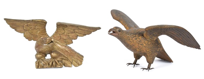 TWO ANTIQUE CARVED AND GILT EAGLES.