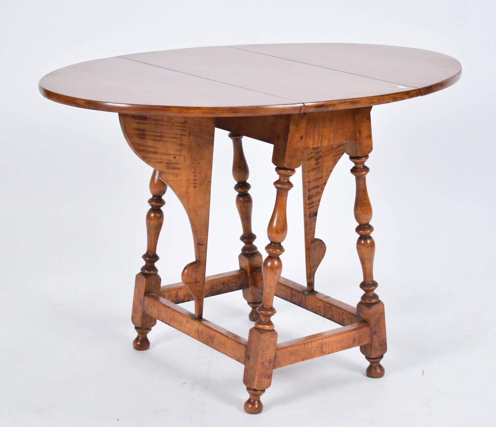 LATE 19TH C./ E. 20TH C. TIGER MAPLE BUTTERFLY TABLE. (1 of 9)