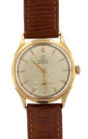 VINTAGE 14K GOLD OMEGA AUTOMATIC WRIST WATCH.