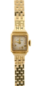 LADYS MID-CENTURY 14K GOLD MOVADO WRIST WATCH.