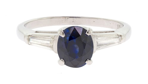 PLATINUM SAPPHIRE & DIAMOND RING.