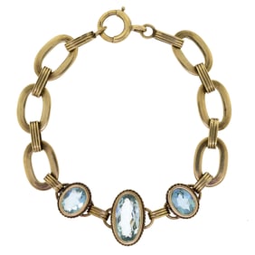 VINTAGE 14K GOLD AQUAMARINE OVAL LINK BRACELET.