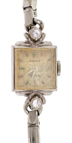 LADYS C. 1950 18K GOLD ROLEX DIAMOND WRIST WATCH.