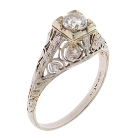 EDWARDIAN PLATINUM FILIGREE DIAMOND RING.