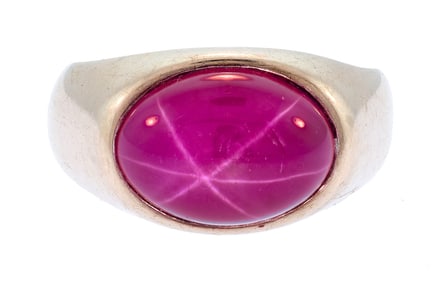 14K GOLD SYNTHETIC STAR RUBY RING.