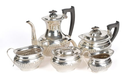 WILLIAM ADAMS STERLING FIVE PIECE TEA SET.