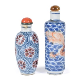TWO ANTIQUE CHINESE BLUE AND IRON RED SNUFF BOTTLES.