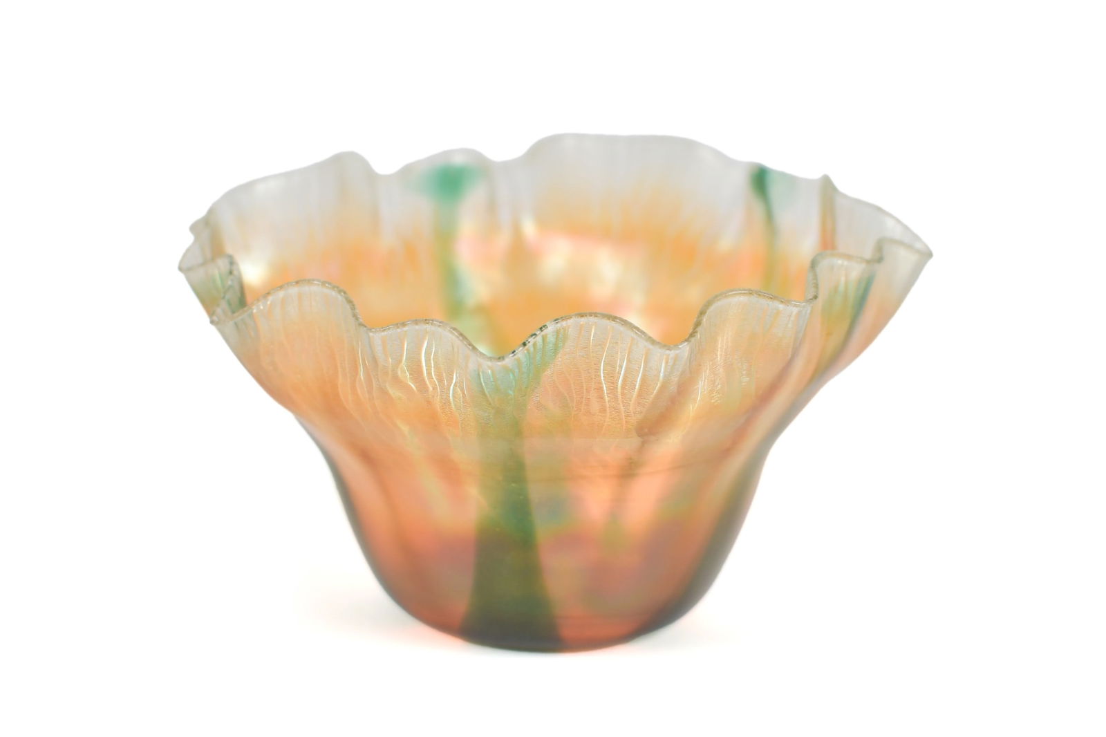 TIFFANY FAVRILE GLASS FINGER BOWL, R9612.: An early 20th C. Tiffany favrile glass iridescent art glass ruffled edge finger bowl, signed on bottom ‘L.C.T. R9612’, 3.25”H x 6” dia.