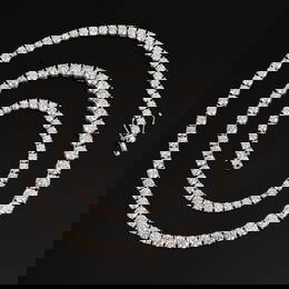 PLATINUM RIVIERE 42 CT. TW. DIAMOND NECKLACE.