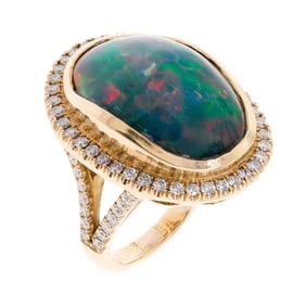 14K GOLD BLACK ETHIOPIAN OPAL & DIAMOND RING.