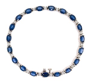 18K GOLD OVAL SAPPHIRE & DIAMOND BRACELET.