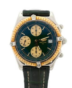 MEN'S STEEL & GOLD BREITLING CHRONOMAT WRIST WATCH.