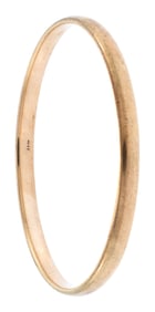 14K YELLOW GOLD OVAL BANGLE BRACELET.