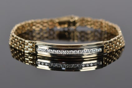 14K TWO-TONE GOLD DIAMOND BAR BRACELET.