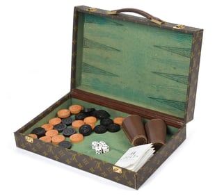 LOUIS VUITTON BACKGAMMON CASE WITH PIECES.