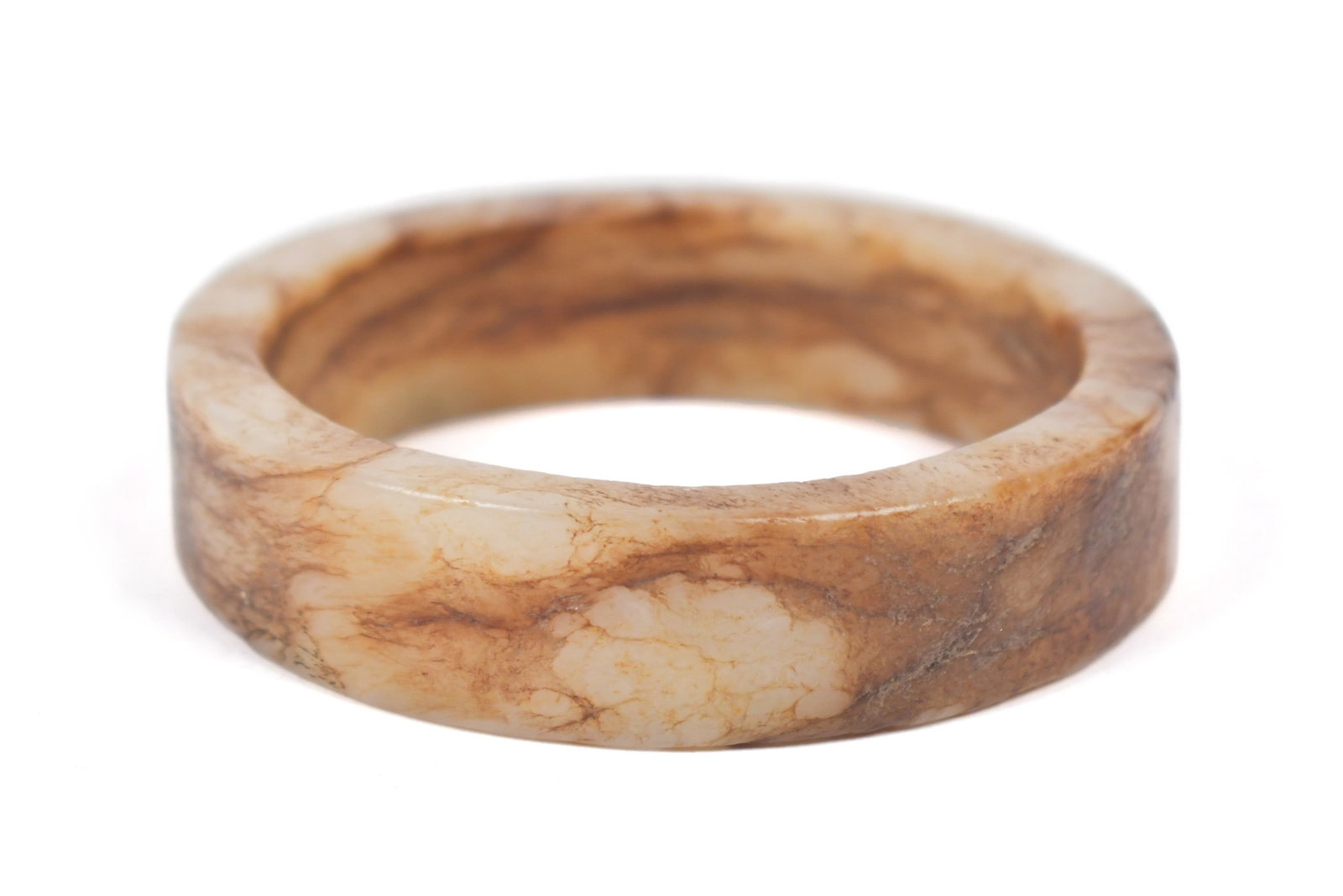 ANTIQUE CHINESE CARVED RUSSET JADE BANGLE BRACELET.: An antique Chinese russet jade bangle bracelet, fitted case. 3.25” exterior diameter.