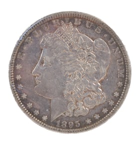 1895-O MORGAN SILVER DOLLAR.
