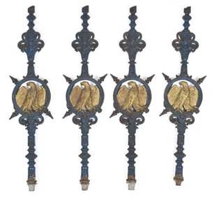 SET OF FOUR 19TH C. CAST IRON EAGLE BALUSTRADES.