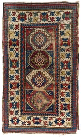 ANTIQUE ORIENTAL CAUCASIAN SCATTER RUG.