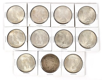TEN ASSORTED PEACE SILVER DOLLARS.