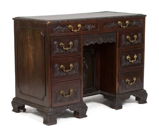 19TH C. GEORGIAN CARVED MAHOGANY KNEEHOLE DESK.