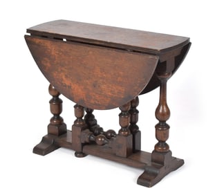 ANTIQUE DIMINUTIVE OAK TUCK-AWAY TABLE.