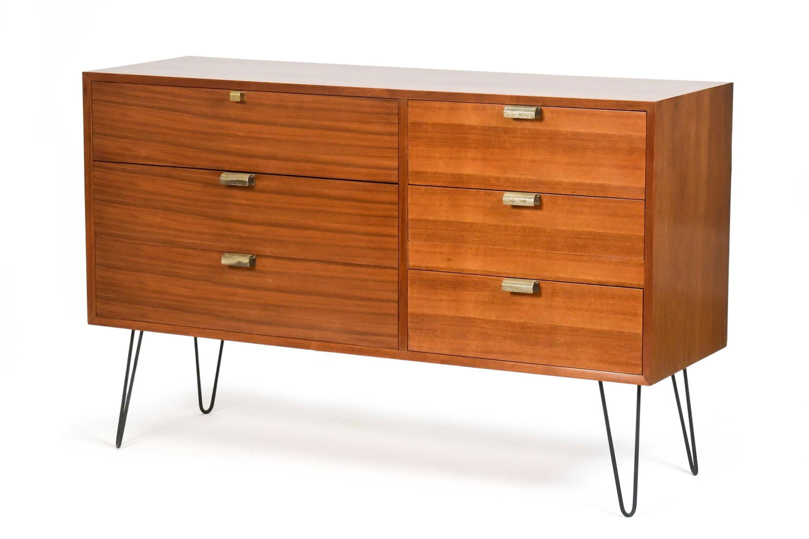 GEORGE NELSON FOR HERMAN MILLER BCS VANITY/DESK.: A ca. 1950 George Nelson for Herman Miller Basic Cabinet Series (BCS) modular vanity/desk with three long drawers alongside three short drawers in walnut. The top left drawer has a fall front which