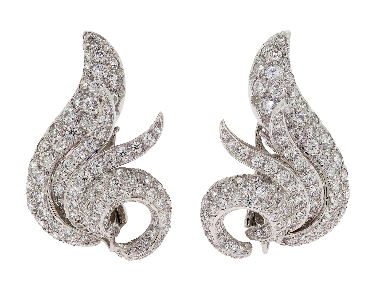 VINTAGE SIGNED VERDURA PLATINUM & DIAMOND EAR CLIPS.: A pair of vintage, signed Verdura, platinum (tested) clip earrings set with approx. 5.0 ct. tw. round brilliant cut, natural diamonds of F-G color and VS clarity, 1 1/4 inches long, 19.1 grams.