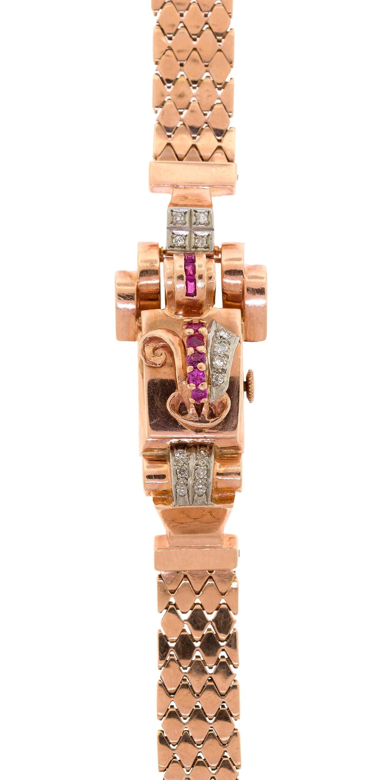 RETRO 14K ROSE GOLD DIAMOND & RUBY WRIST WATCH.: A retro, 14k rose gold (stamped) wrist watch set with approx. .50 ct. tw. single cut round, natural diamonds of H-I color and VS-SI clarity and faceted round and baguette cut, medium purplish red