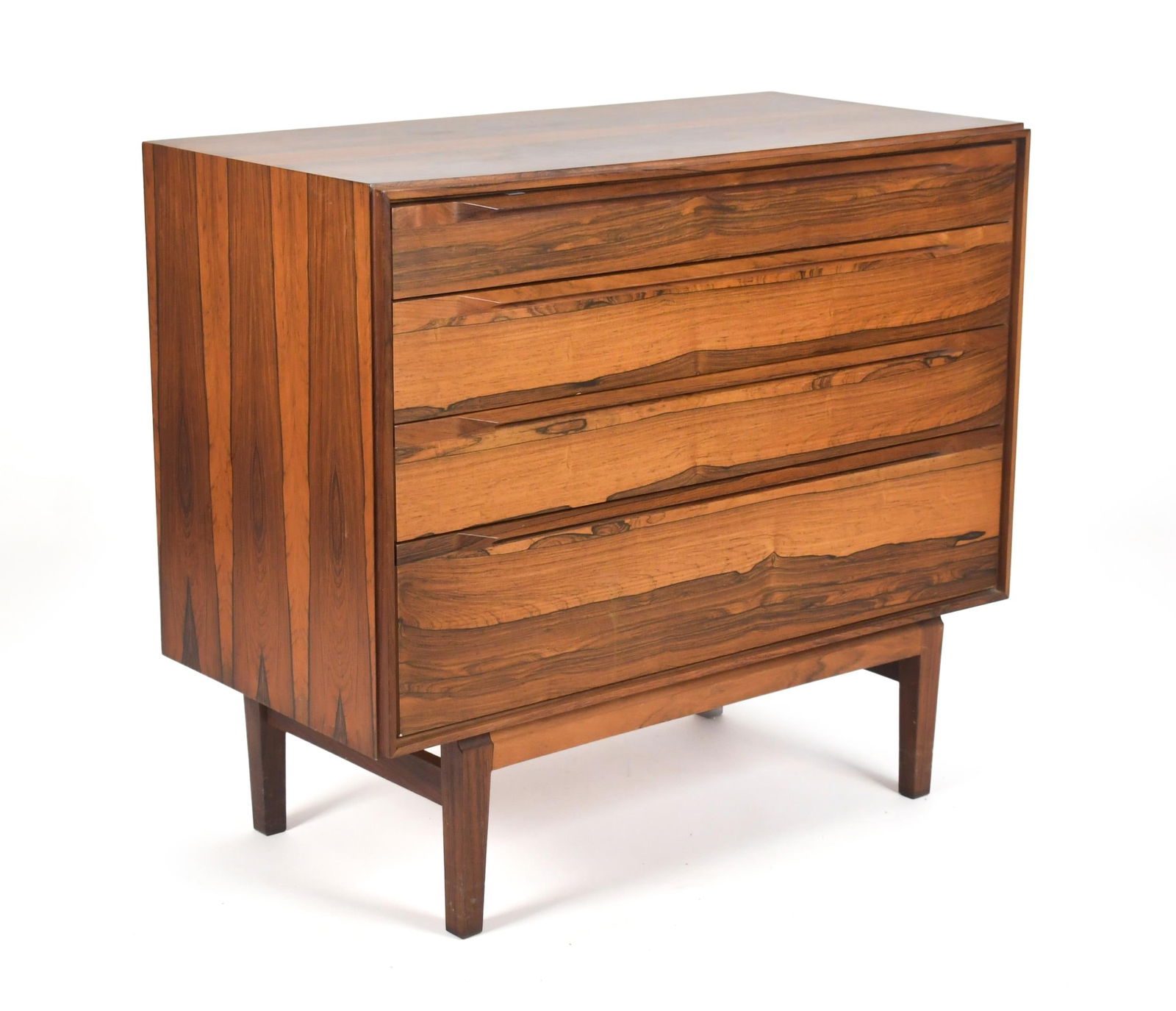 VINTAGE FREDERICIA MOBLER DANISH ROSEWOOD CHEST.: A vintage Fredericia Mobler Danish rosewood four drawer chest, labeled on back. 31”H x 35.5”W x 17.5”D.
