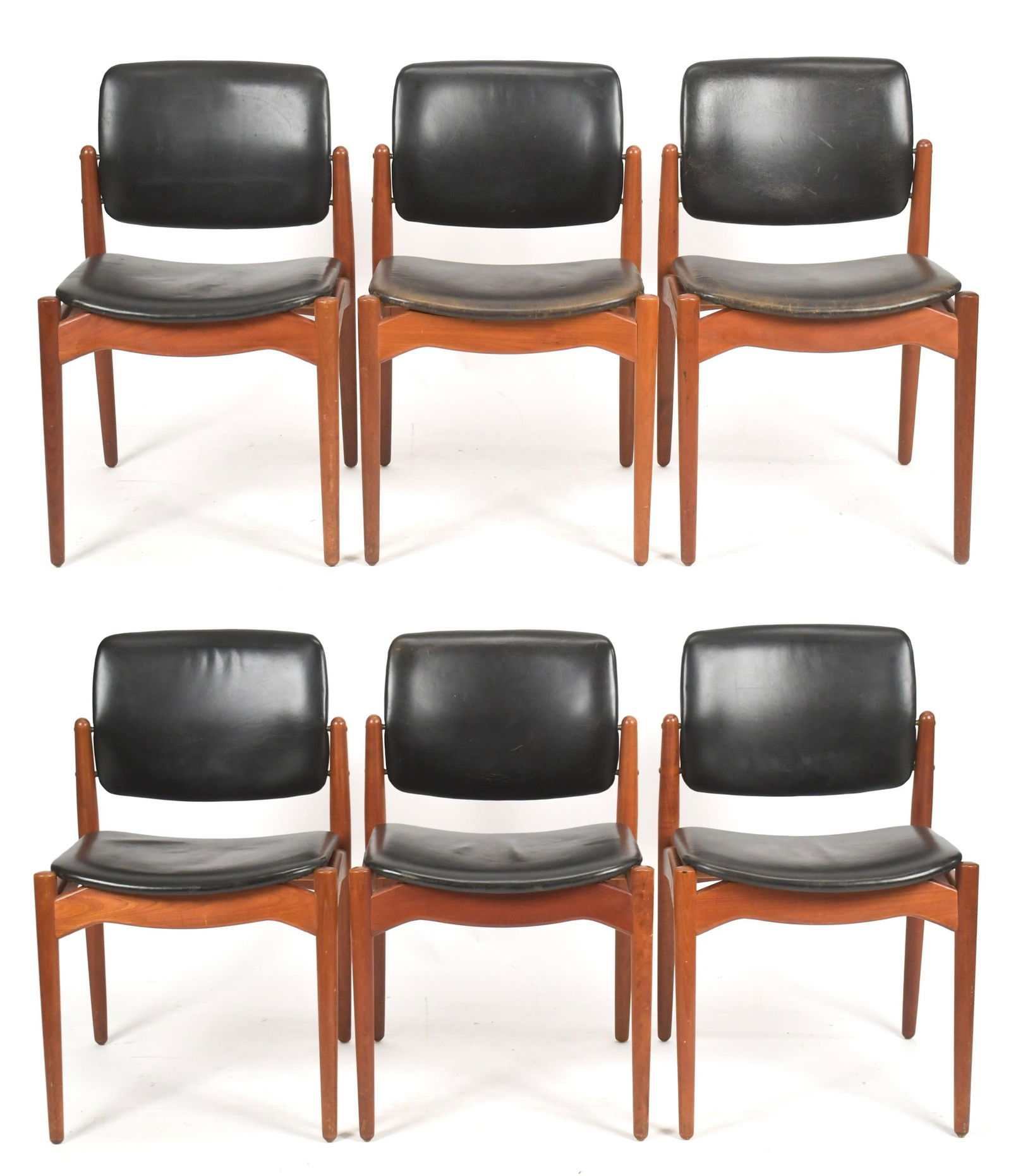 ERIK BUCH FOR ORUM DANISH TEAK DINING CHAIRS, 6PCS.: A set of six vintage Erik Buch for Orum signed, Danish teak and black leather dining side chairs. Signed on bottom ‘Orum Made in Denmark’. 31”H x 19.75”W x 22”W x 17̶