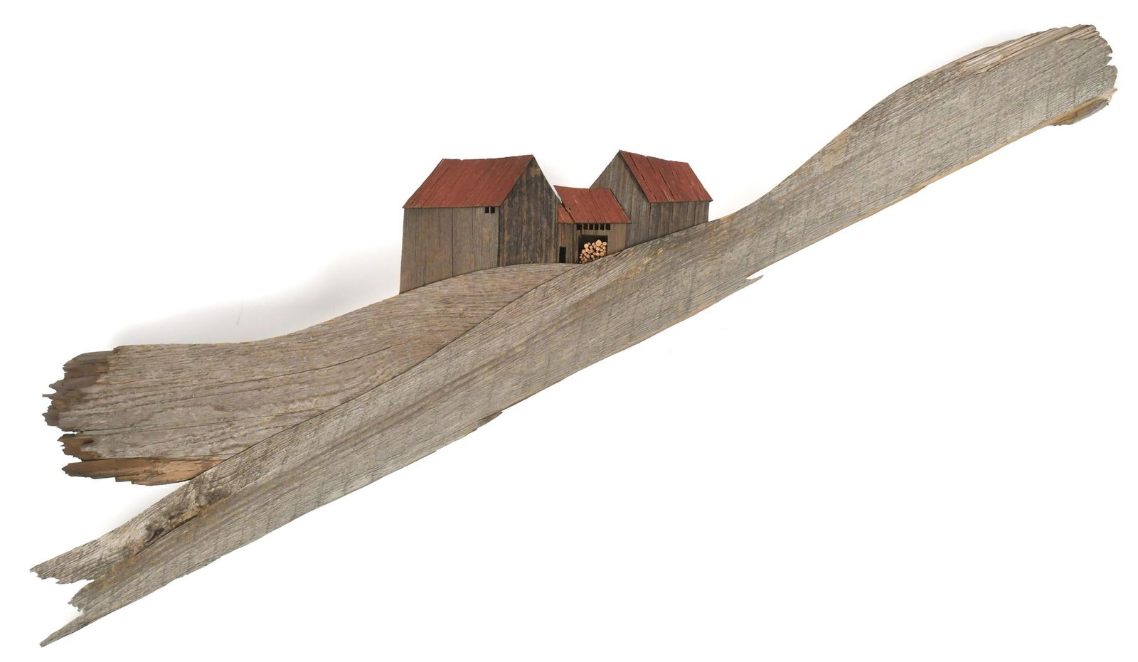 JOHN LONG BARN BOARD ART, CONNECTING BARNS.: A vintage John Long labeled barn board artwork, ‘Connecting Barns’. 10”H x 46.5”W.