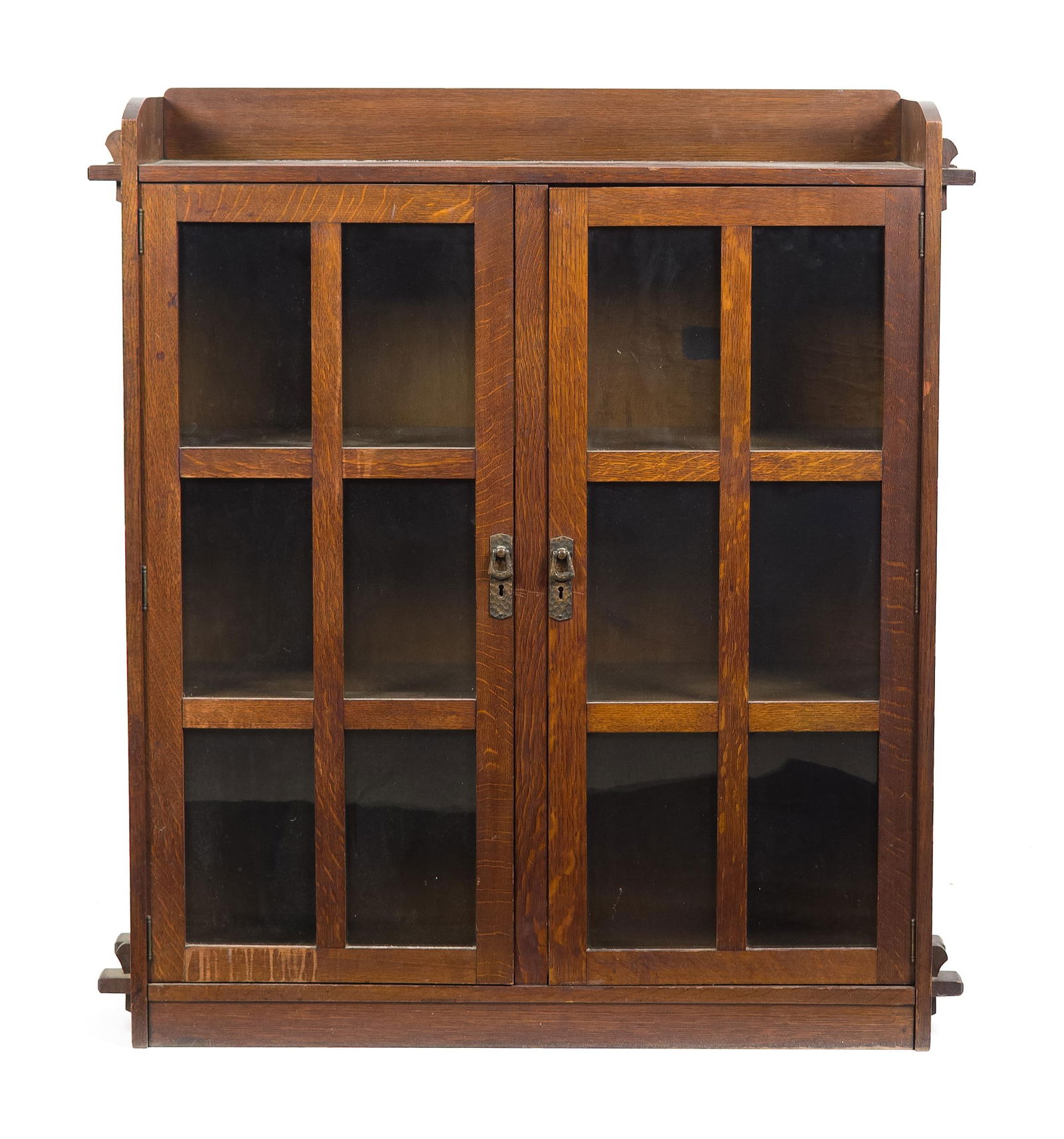 ANTIQUE MISSION OAK DOUBLE DOOR BOOKCASE.: An early 20th C. Arts & Crafts/Mission oak double door bookcase, with through-tenon keyed construction. Remnants of an old removed label on back, no other indications of maker, Stickley quality constr