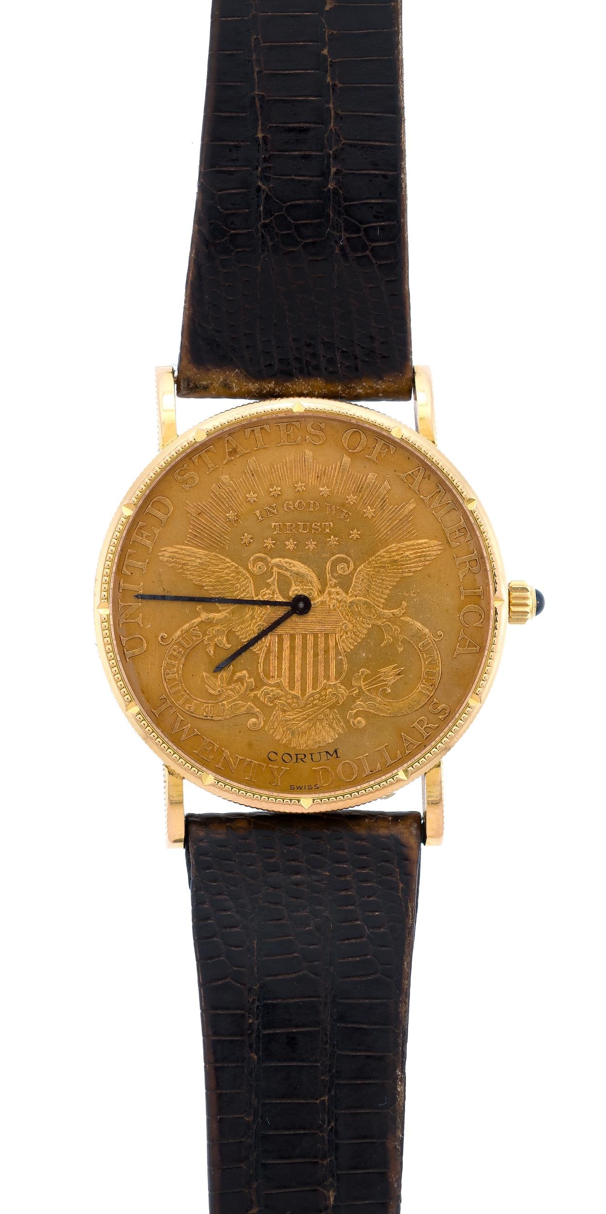 18K GOLD CORUM $20 LIBERTY GOLD COIN WATCH.: An 18k yellow gold (stamped) case, Corum wrist watch, model 142.019, 18 jewels, mechanical movement, syn. sapphire crown, 34.4mm case, with 22k yellow gold coin, caseback is Lady Liberty 1904, with
