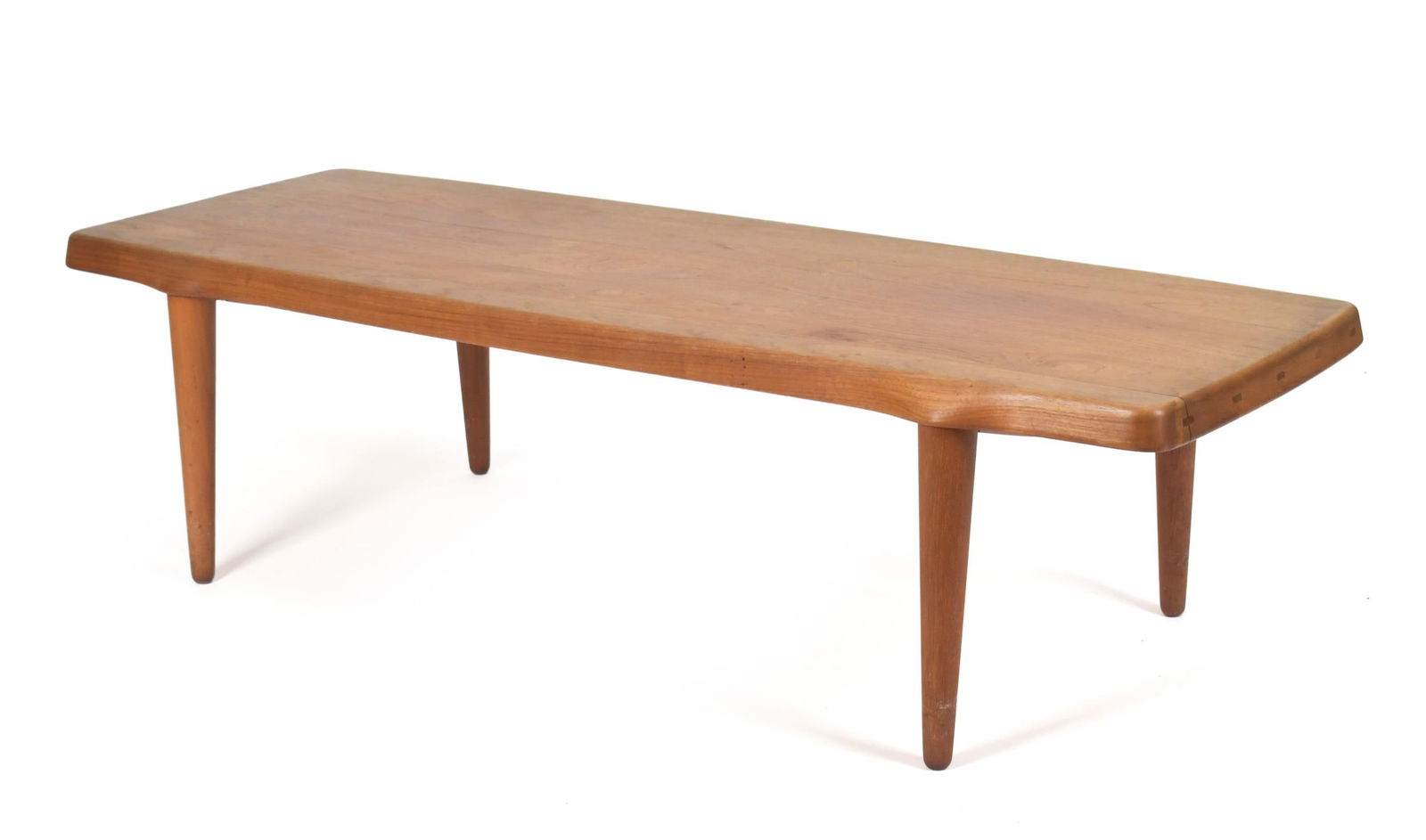 JOHN BONE VINTAGE DANISH TEAK COFFEE TABLE.: A vintage John Bone branded Danish teak coffee table.15”H x 56.5”W x 21”D.
