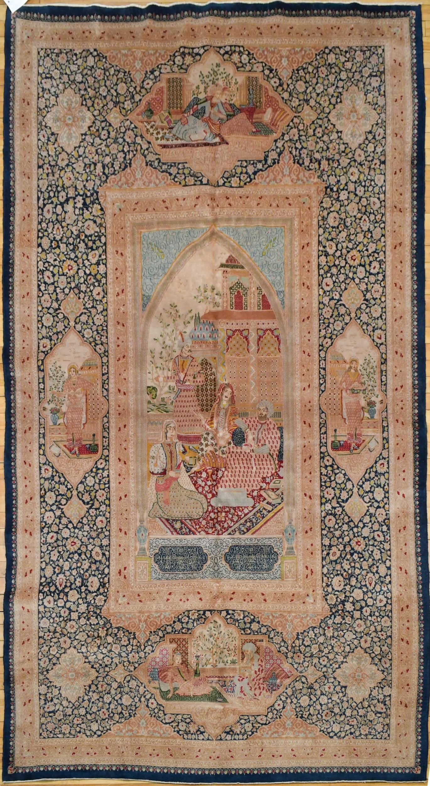ANTIQUE ORIENTAL KERMIN PICTORIAL AREA RUG.: An antique hand woven pictorial area rug, musician and figures in courtyard, surrounded by figural cartouches. 5’4” x 9’.
