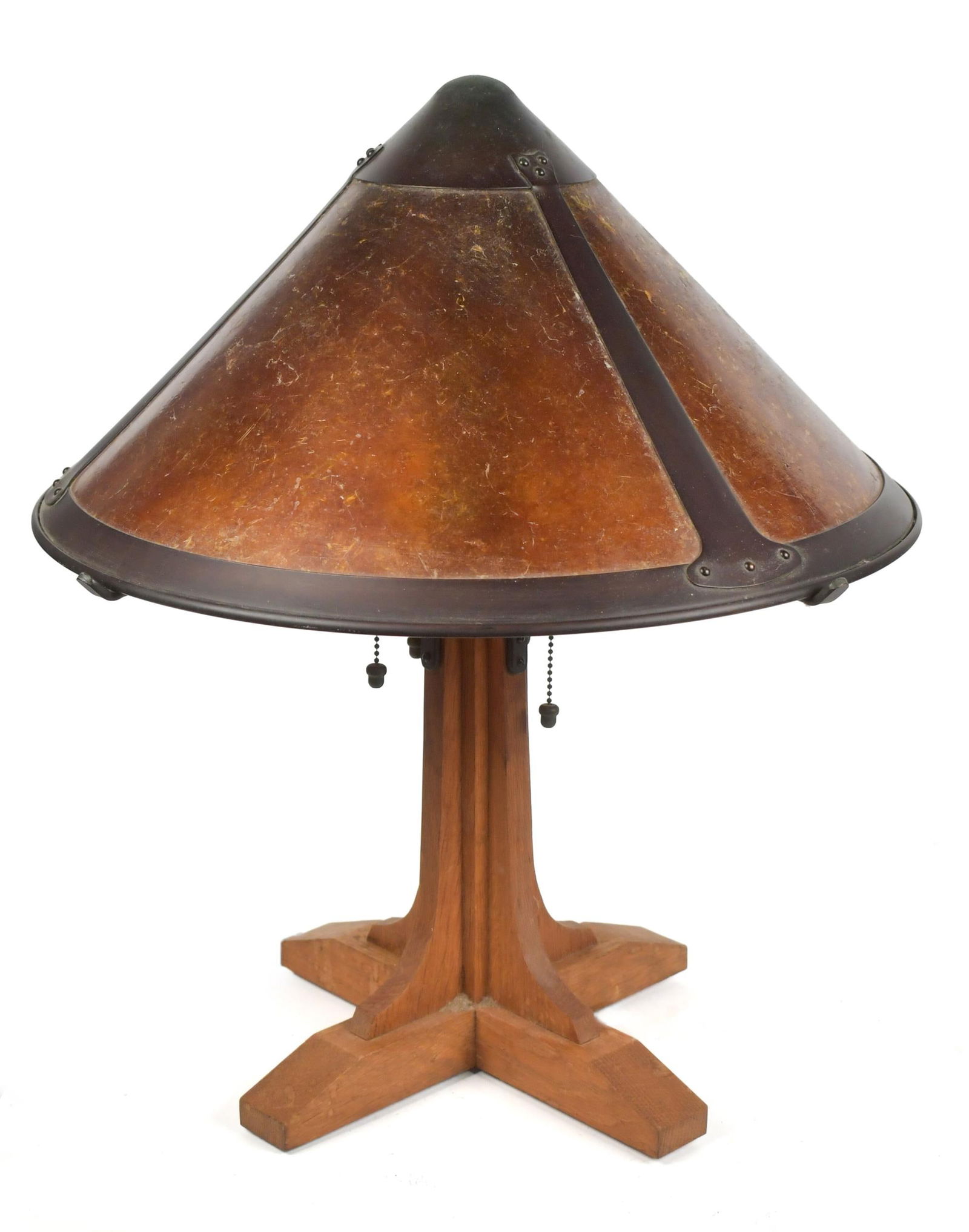 MICA SHADE CO ARTS & CRAFTS OAK LAMP.: A 20th C. Mica Shade Co. Mission oak table lamp, with a paneled mica shade and an oak base,25”H x 21” shade dia.