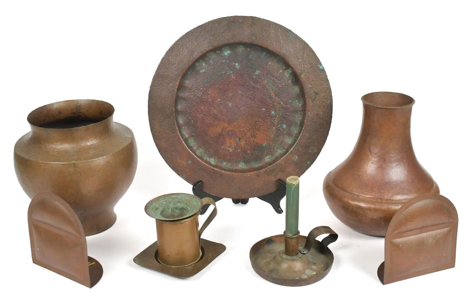 VINTAGE COPPER, 9PCS.: Vintage unsigned hammered copper, nine pieces including; two vases 9” & 10”H, pair of bookends 6”H, charger 14”, and more.