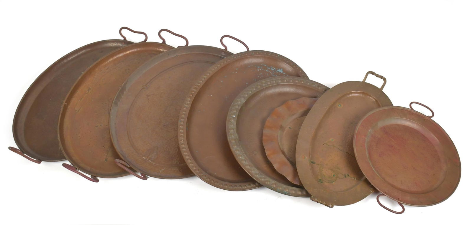 EIGHT VINTAGE COPPER TRAYS, SOME SIGNED.: Eight vintage copper trays, many signed E.L.B with vessel insignia. Ranging in size from 12”W to 21”W.