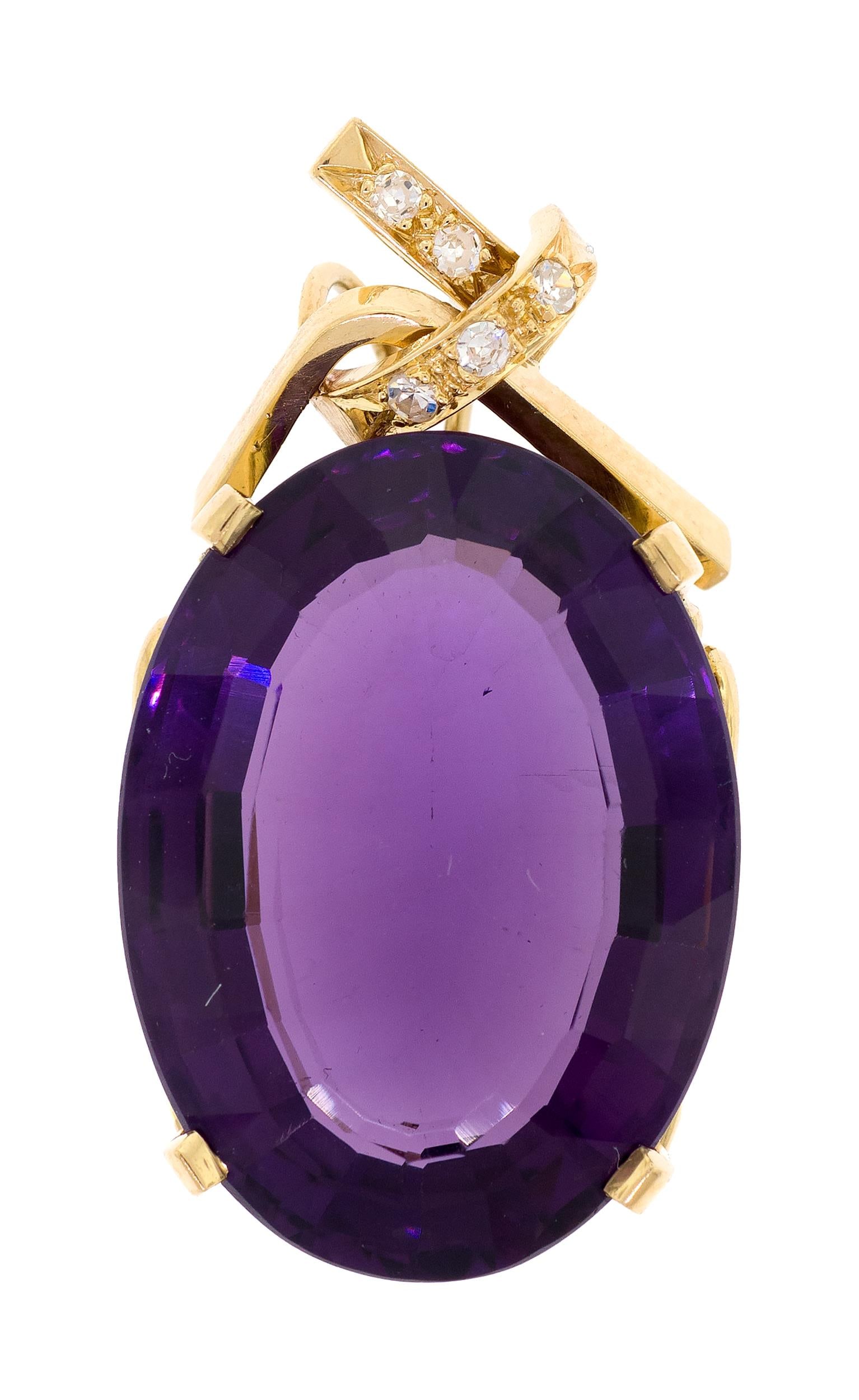 18K GOLD AMETHYST & DIAMOND PIN/PENDANT.: An 18k yellow gold (stamped) pin/pendant set with an approx. 24 ct., faceted oval, medium dark purple amethyst and approx. .08 ct. tw., single cut round, natural diamonds of G-H color and VS clarity,
