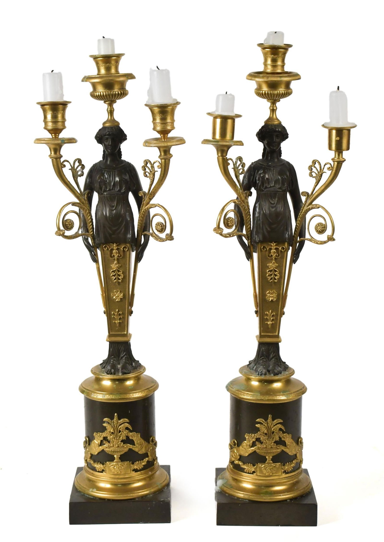 PR. 19TH C. EMPIRE STYLE CARYATID FORM CANDELABRAS.: A fine pair of late 19th C. French Empire style gilt and patinated bronze caryatid form double branch candelabras.22.5”H x 7”W.
