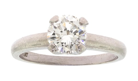 PLATINUM .93 CT. SOLITAIRE DIAMOND ENGAGEMENT RING.