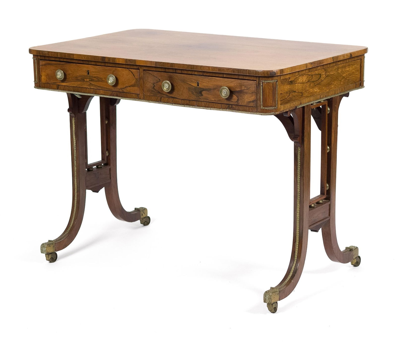 EARLY 19TH C. ENGLISH REGENCY ROSEWOOD SOFA TABLE.: A ca. 1815 English Regency rosewood sofa table, with two working drawers and two faux drawers, with brass trim throughout, on a trestle base with caster feet. 29”H x 37”W x 24”D. Pro