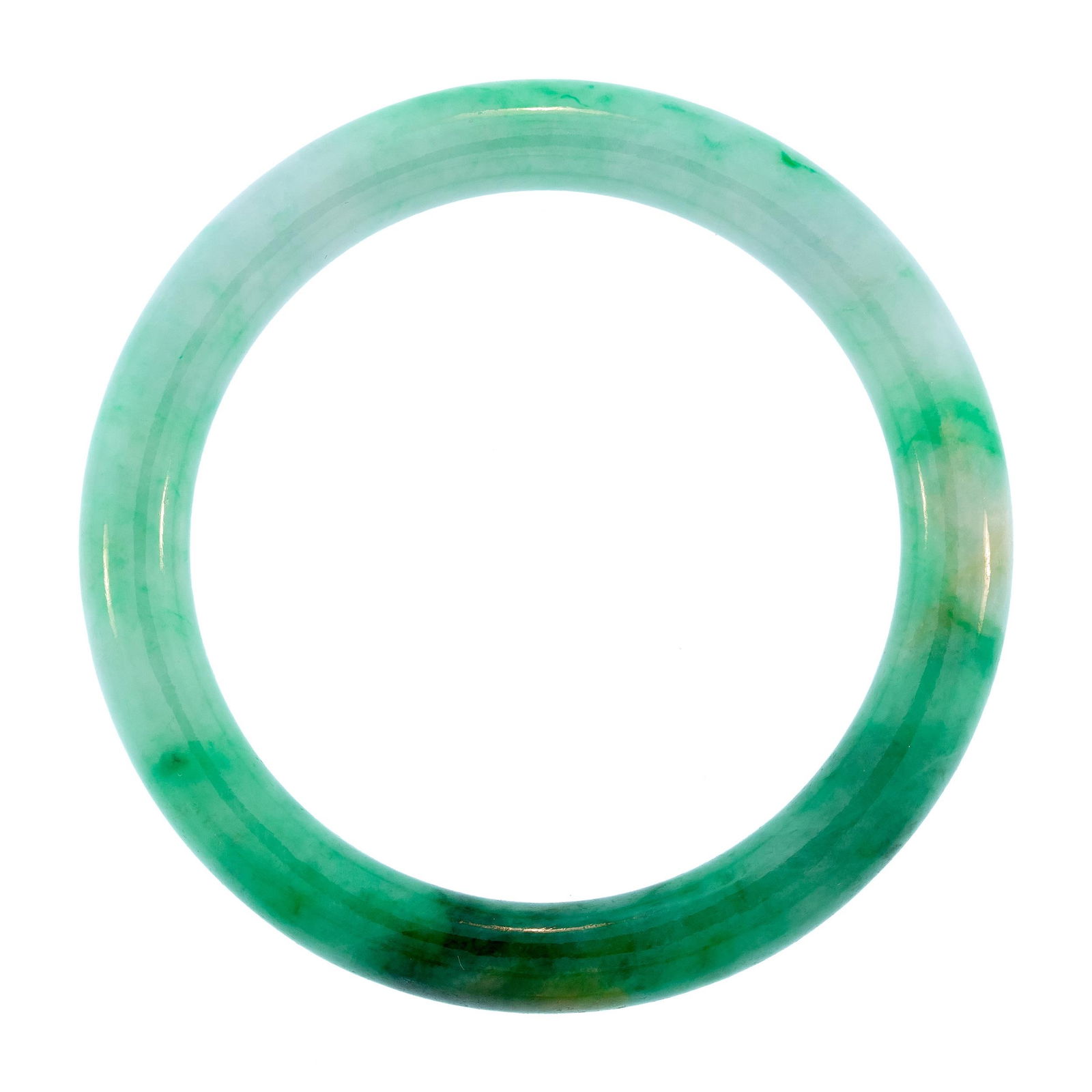 CHINESE MOTTLED WHITE & GREEN JADE BANGLE.: A Chinese, carved, mottle white and green jade bangle, semi-translucent to opaque, 10mm thick, 7 3/8 inch wrist.