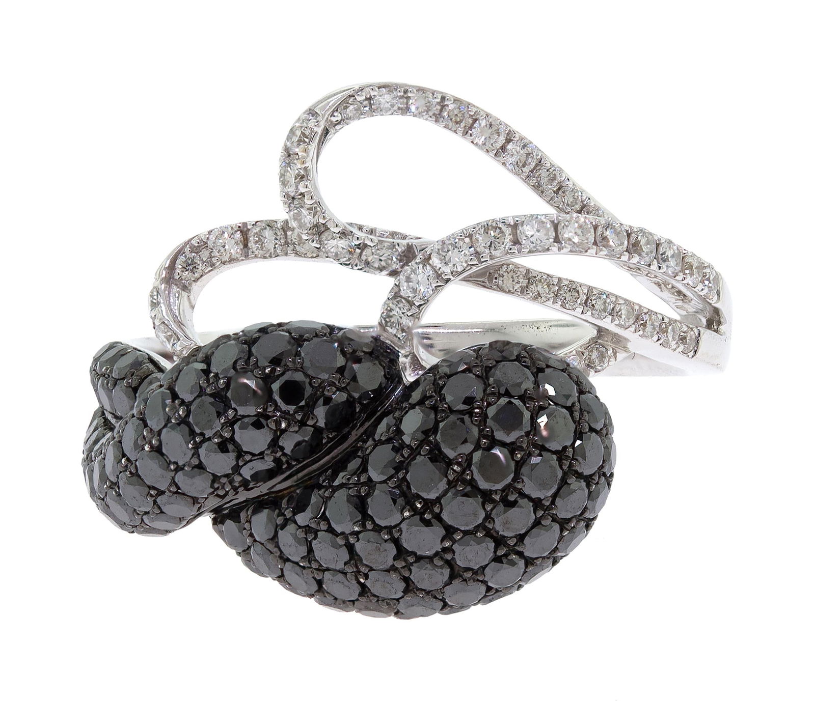 18K GOLD BLACK & WHITE DIAMOND RING.: An 18k white gold (stamped) ring set with approx. 1.16 ct. tw. round brilliant cut, black diamonds and natural diamonds of F-G color and VS clarity. Ring size 7, 15mm wide, 4.9 grams. Tested as