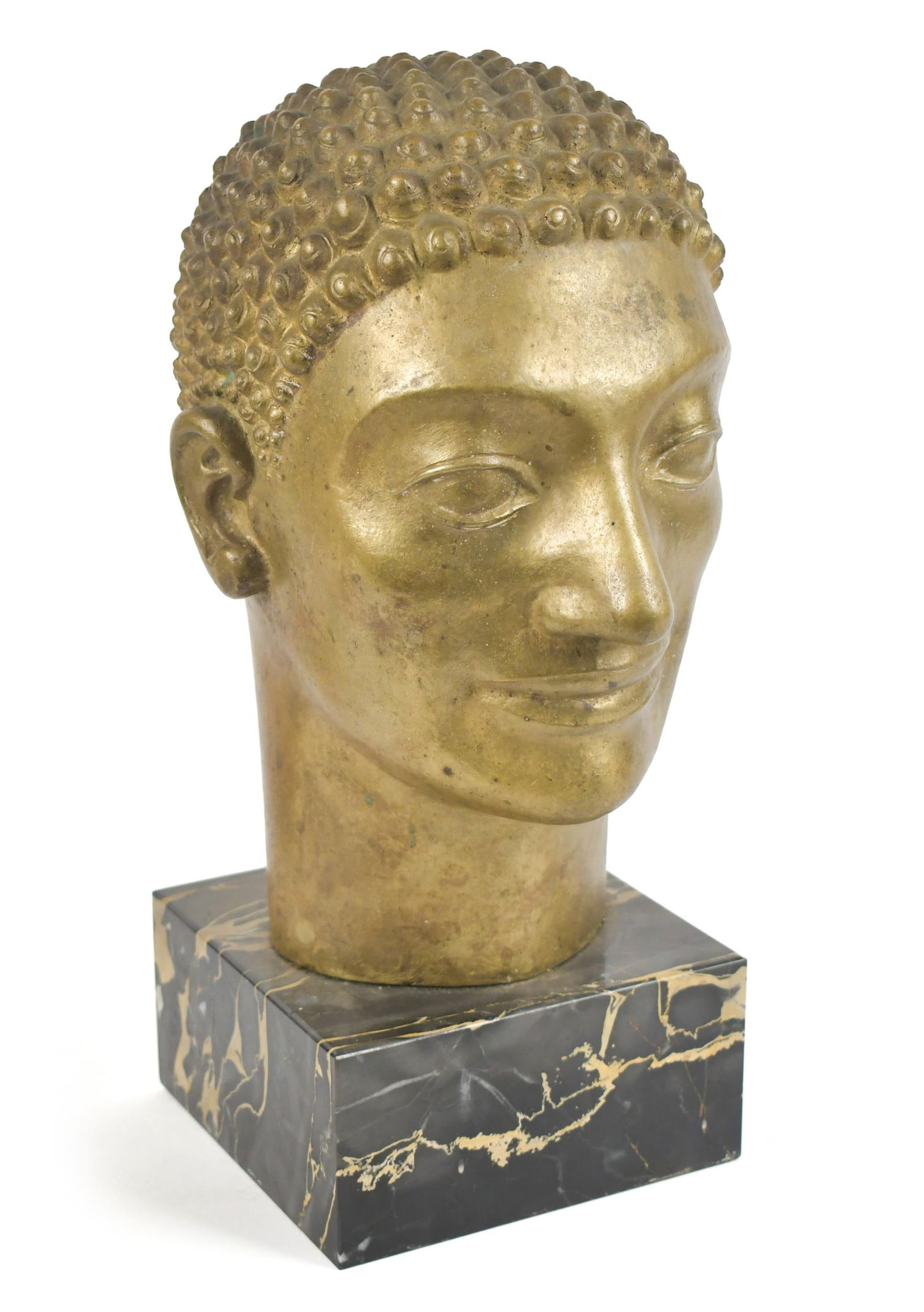 ART DECO BRONZE SCULPTURE, HEAD OF MAN.: An Art Deco bronze bust of man, on a black marble base, unsigned. 14”H x 6”W x 6”D. Provenance: Ilse Bischoff/Timotheus Pohl Estate.