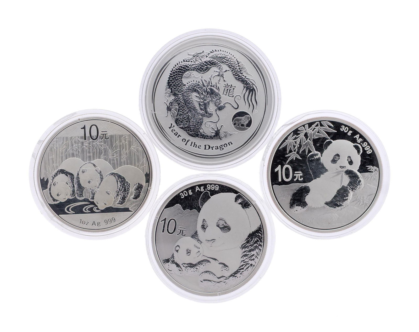 THREE CHINESE SILVER PANDA COINS AND 1 OZ AUSTRALIAN.: Three,Chinese, .999 silver, Panda coins, 2013, 2019 and 2020, 30 grams each. A 2012, 1 oz., .999 silver, Australian, Queen Elizabeth, Year of the Dragon coin, each in its own acrylic case.